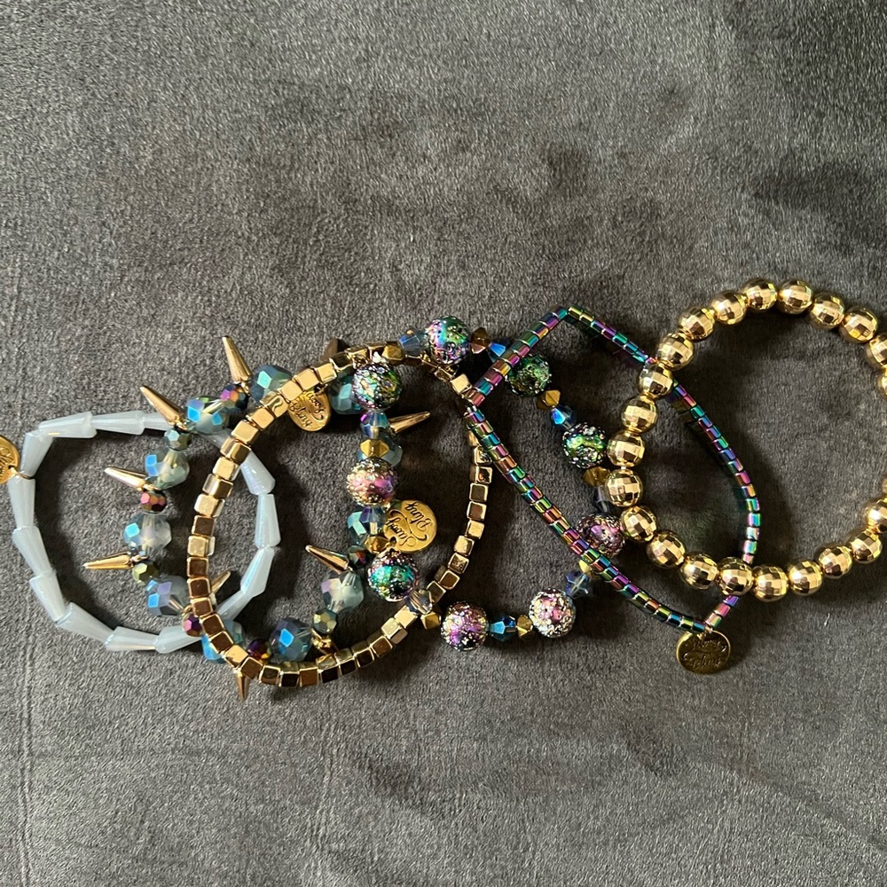 Brand new, never worn stretch oil slick bracelet set.